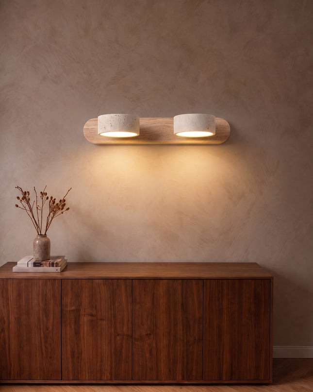 Cava wall light, 2 lights, travertine and natural wood, above a walnut sideboard