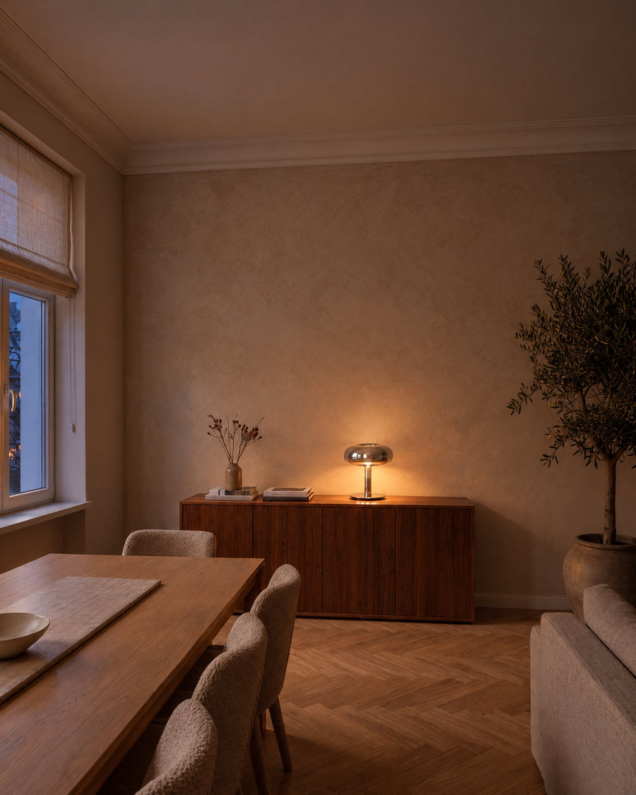 Fungo mushroom lamp on a sideboard in a dining room at dusk