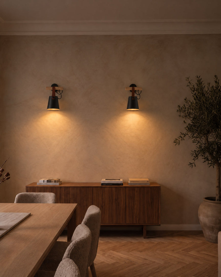 Two Monaco wall lights above a walnut sideboard