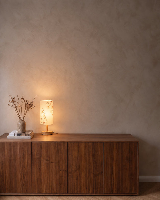 Acerra table lamp in Magnolia White on a walnut sideboard