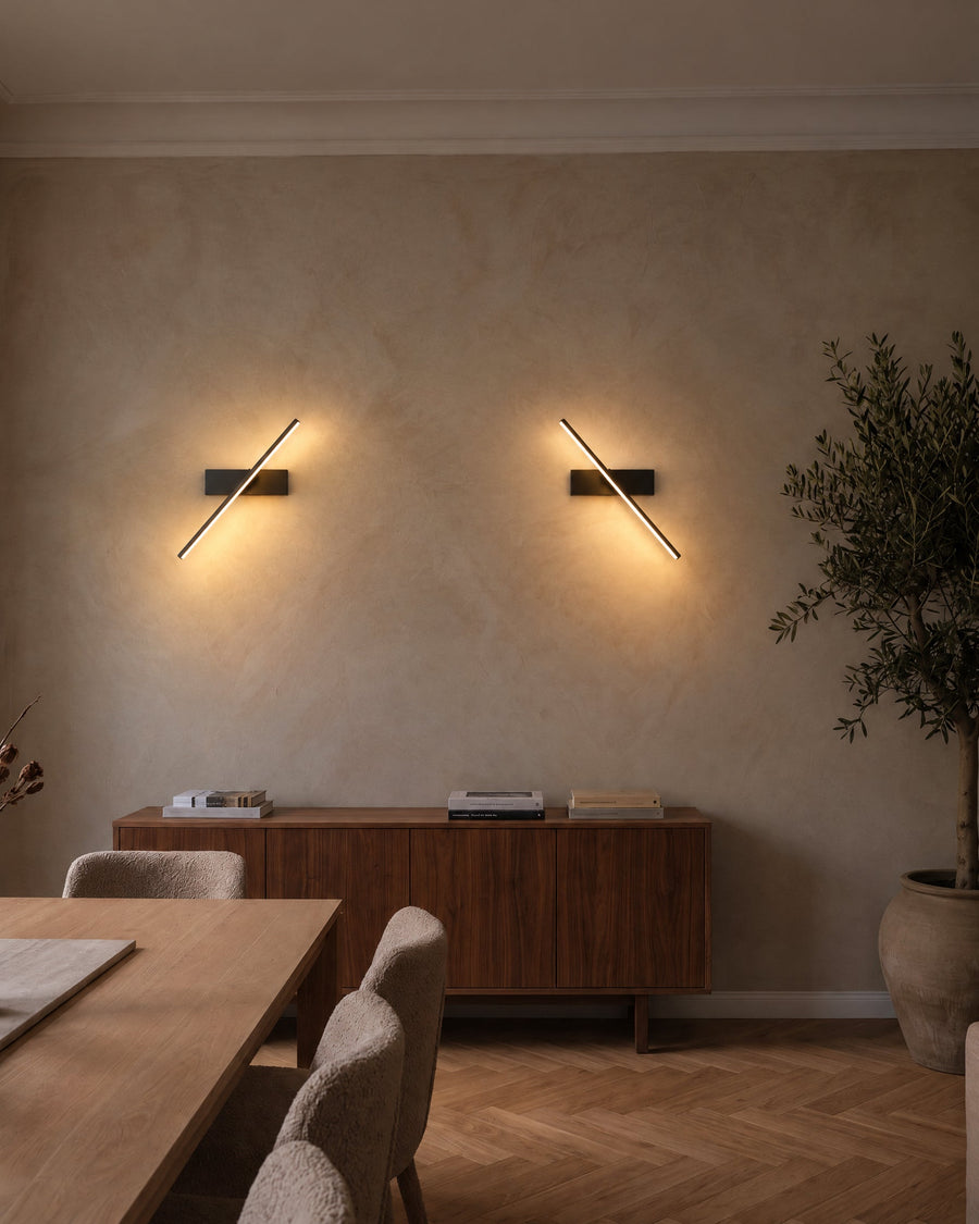 Two Rome wall lights above a sideboard in a dining room