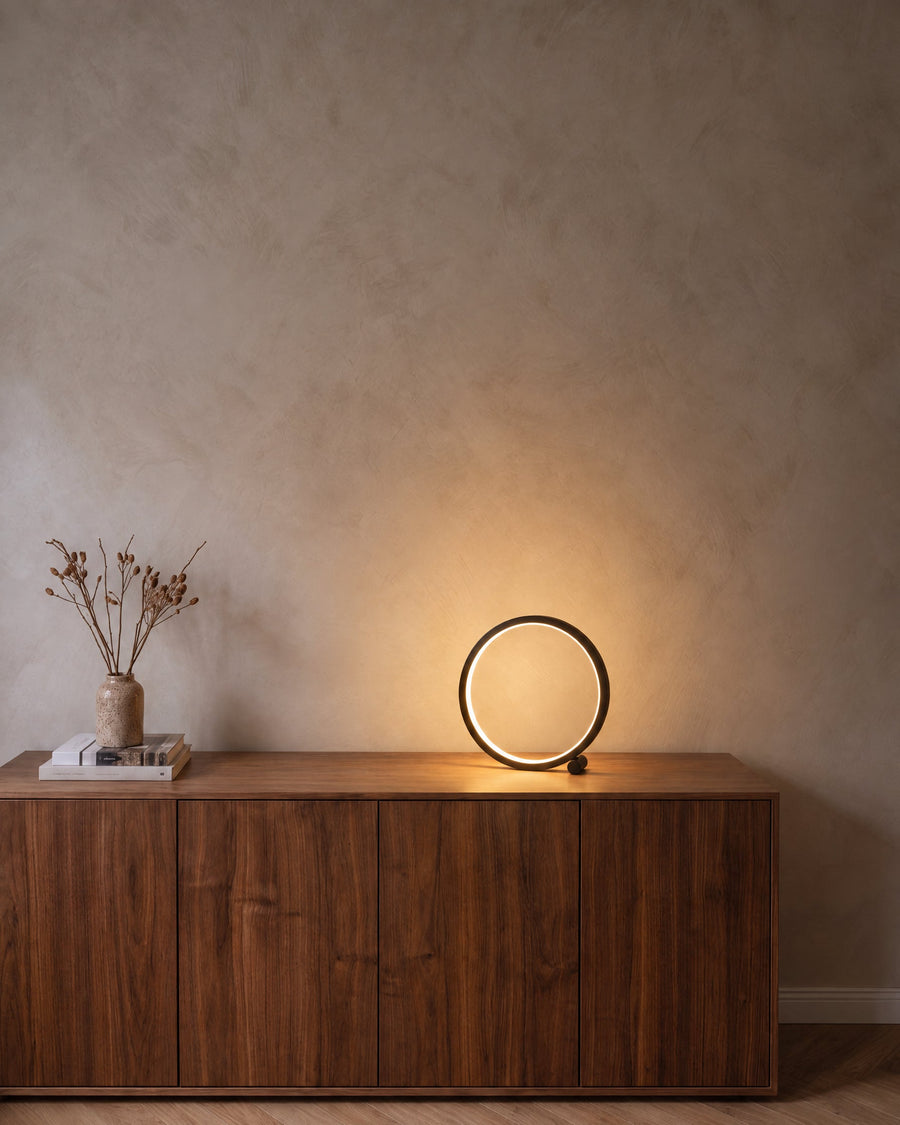 Verona table lamp in black on a walnut sideboard