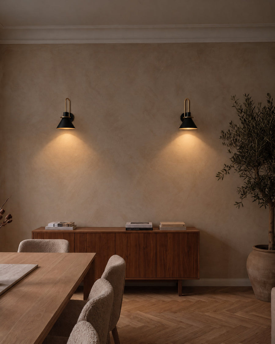 A pair of Lecce wall lights above a sideboard in the dining room