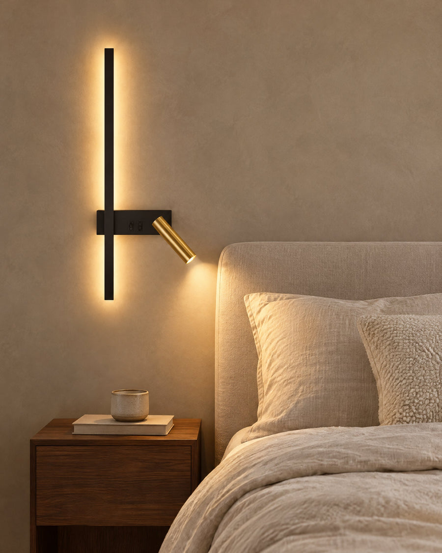 Norda wall light as a reading light next to the bed in a bedroom