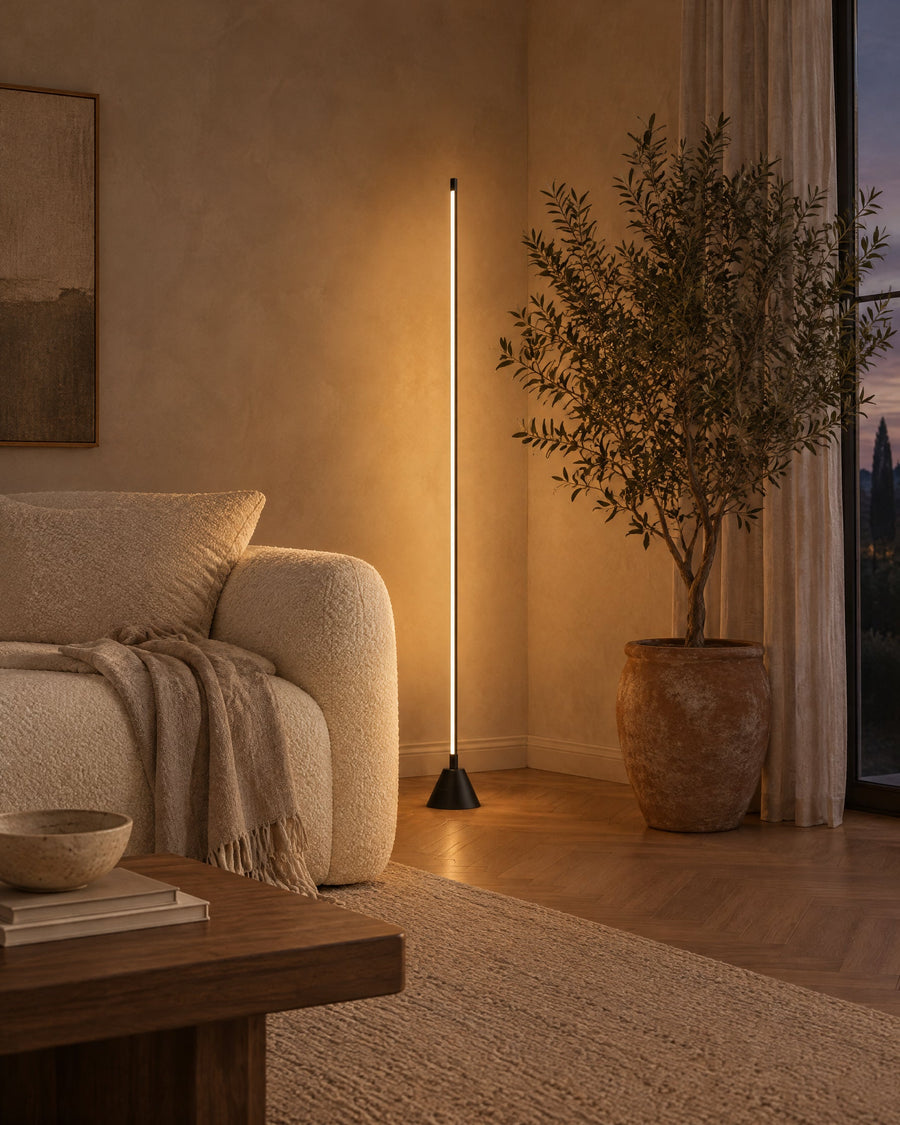 Tero floor lamp in a living room next to the sofa