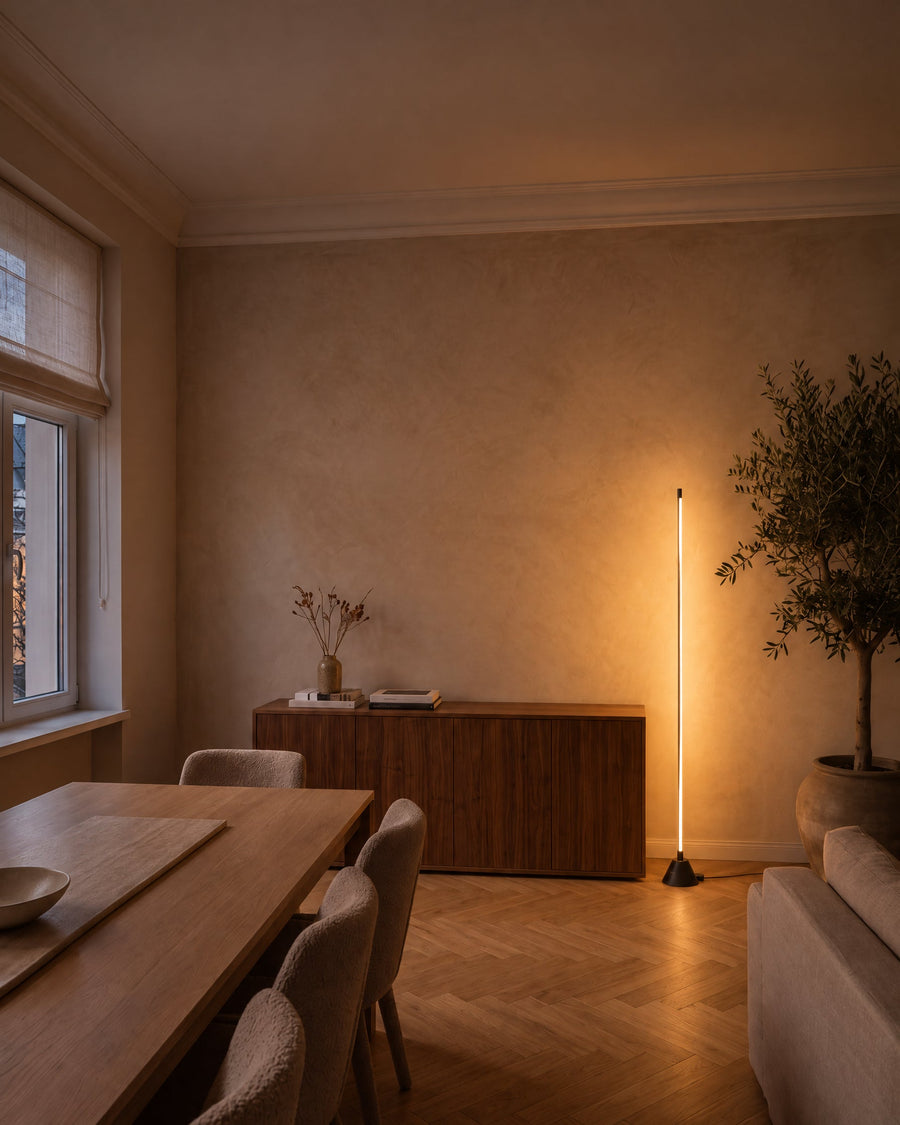 Tero floor lamp in a dining room in the evening