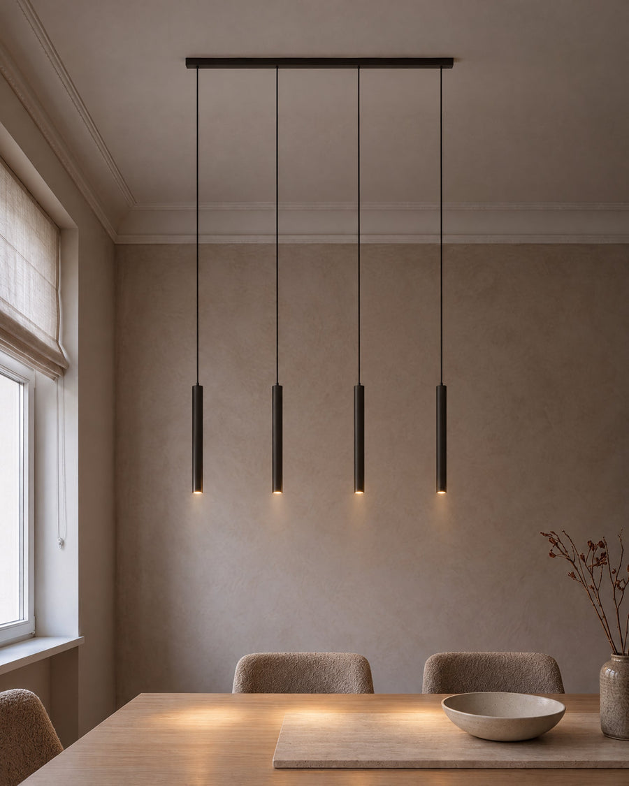 Lino pendant light with 4 lights in matt black above the dining table