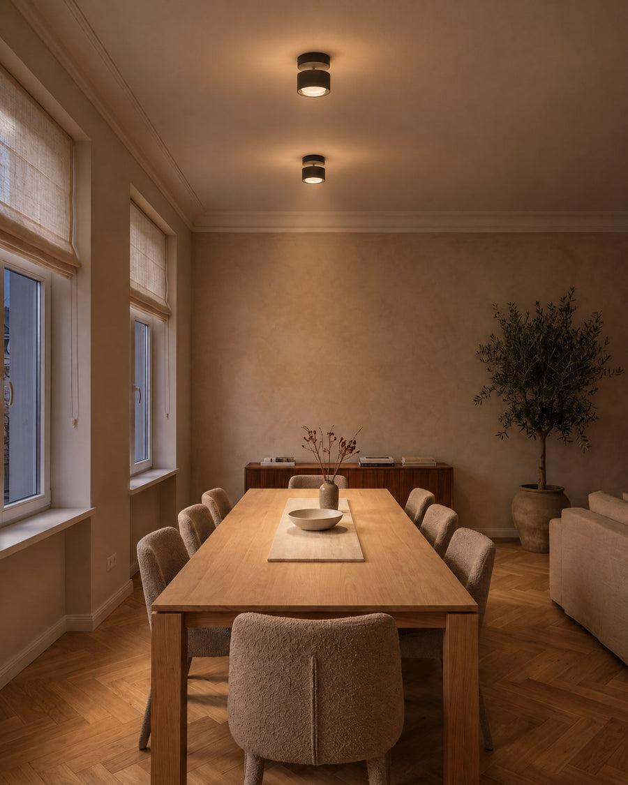 Two Nodo ceiling lights in a dining room