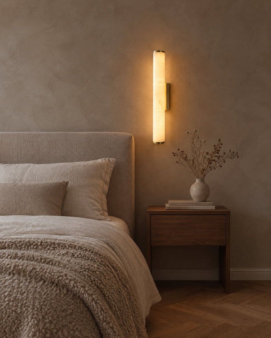 Klyr wall light beside the bed in a bedroom