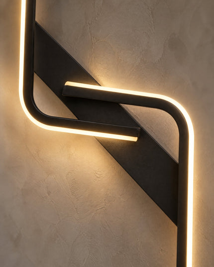 Close-up of the wave in the Strea wall light with its strip of light