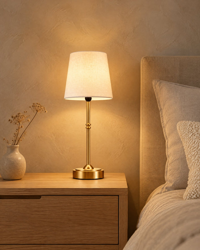 Sera cordless table lamp with fabric shade on an oak bedside table in the bedroom