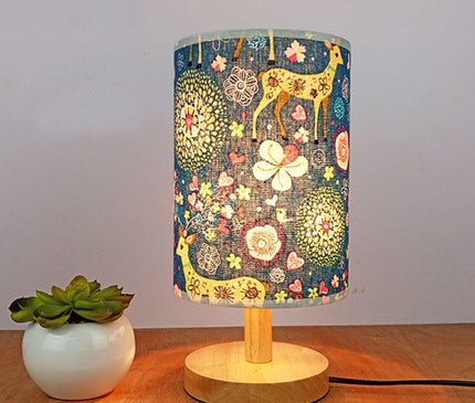 Kezaro Acerra Lampe with a sleek modern design, featuring a round white lampshade and metal base.