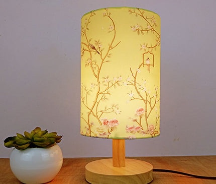 Kezaro Acerra lamp with a sleek modern design, featuring a white shade and metallic base for contemporary home decor.