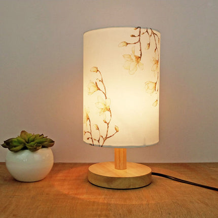 Kezaro Acerra lamp with a sleek modern design, featuring a cylindrical shape and a soft glowing light for stylish home lighting.