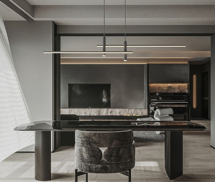 Black Kezaro Pavo pendant light, 90cm dimmable lighting fixture with warm white glow, showcasing modern design and sleek finish.