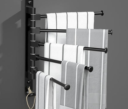 Kezaro Cremona towel holder with three horizontal bars for bathroom towels, mounted on a wall in a modern bathroom setting.