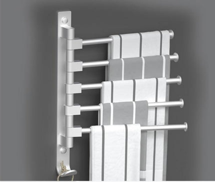 Kezaro Cremona towel holder with three horizontal bars for bathroom towels, mounted on a wall in a modern design.