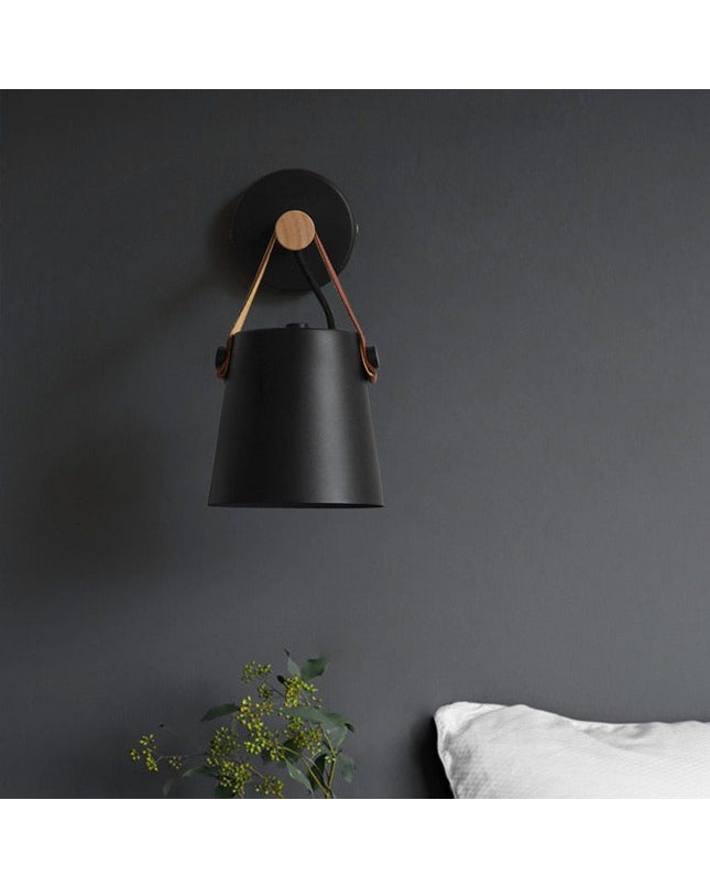 Kezaro Monaco wall lamp featuring a sleek modern design with a metallic finish and adjustable arm for versatile lighting.