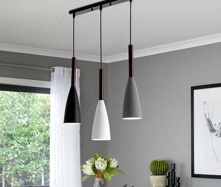 Black Monaco hanging light by Kezaro featuring a sleek, modern design with a round shade and metal finish.