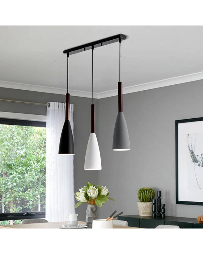 Black Monaco hanging light by Kezaro featuring a sleek, modern design with a round shade and metal finish.