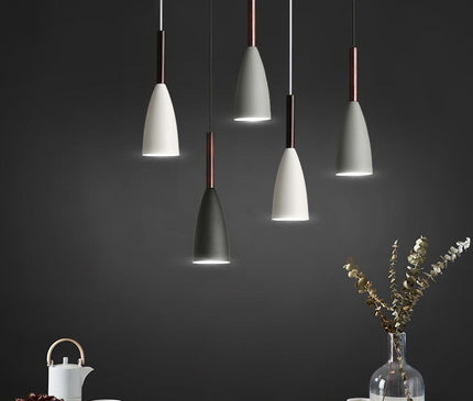 Kezaro Monaco pendant light in black with sleek modern design, hanging from the ceiling with a minimalist style.