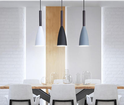 Black Monaco pendant light by Kezaro featuring a sleek, modern hanging design with a minimalist style and metal finish.