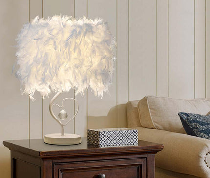 Kezaro Bolzano Lampe with round knob switch and modern design, featuring a sleek metal finish and minimalist style.