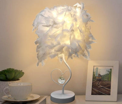 Kezaro Bolzano Lampe with round knob-style base and sleek modern design, featuring a metallic finish.