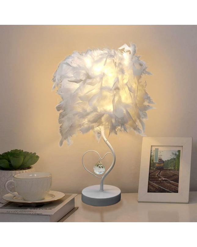Kezaro Bolzano Lampe with round knob-style base and sleek modern design, featuring a metallic finish.