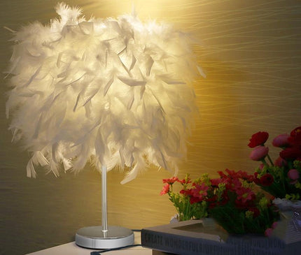 Kezaro Bolzano Lampe featuring a sleek, modern design with a round knob switch and stylish finish.