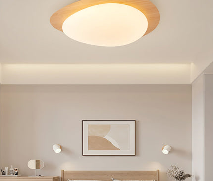 Kezaro Qube ceiling lamp in Nussbaum wood with warm light, showcasing a 30cm diameter design and natural wood grain finish.
