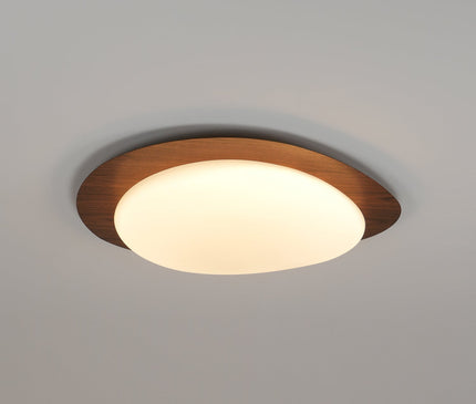 Kezaro Qube ceiling lamp in Nussbaum walnut wood with warm light, featuring water transfer printing and a 30cm diameter.