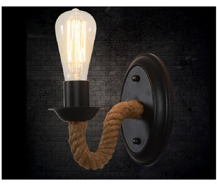 Kezaro Pescara table lamp with a sleek, modern design and a cylindrical shape, shown without a light bulb.