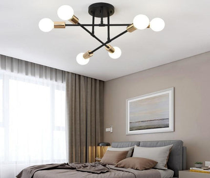 Kezaro Florenz lamp with black and gold finish, featuring a modern, elegant design and intricate detailing.