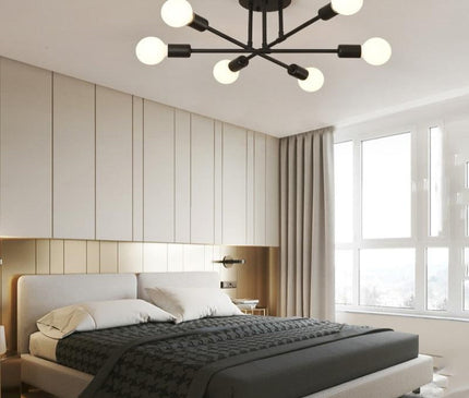 Kezaro Florenz lamp with black and gold finish, featuring a modern design and intricate detailing on the lampshade.
