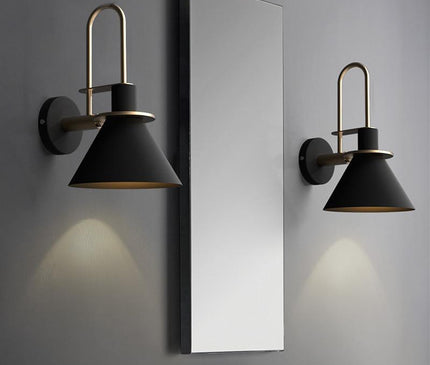 Kezaro Lecce black wall sconce light fixture with modern design and sleek finish, mounted on a wall for indoor lighting.