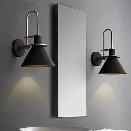 Kezaro Lecce black wall sconce light fixture with modern design and sleek finish, mounted on a wall for indoor lighting.
