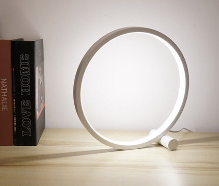 Kezaro Verona Lampe with black and warm white finish, modern table lamp with sleek design and illuminated soft light.