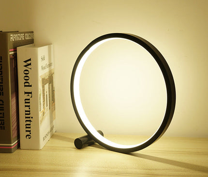 Kezaro Verona Lampe in black with warm white light, modern table lamp with sleek design and minimalist aesthetic.
