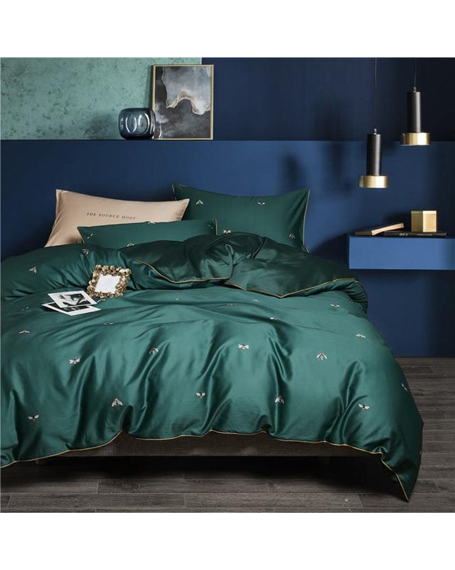 Kezaro Trieste bed linen set with a fitted sheet, duvet cover, and pillowcases in a 4-piece design, featuring elegant patterns.