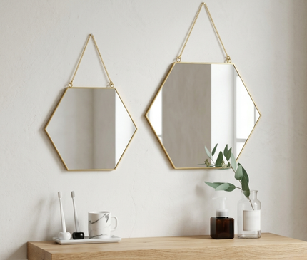Galen wall mirror with a hexagonal shape and gold frame by Kezaro, measuring 30x26 cm, decorative and stylish home accent.