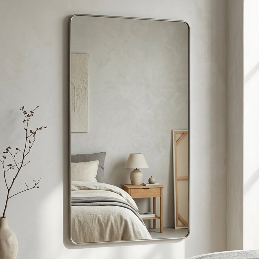 Avela wall mirror in a bedroom