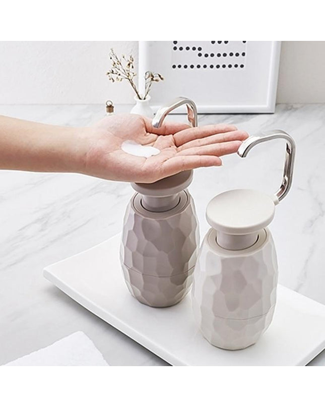 Kezaro warm gray one-handle liquid soap dispenser with sleek design and easy pump mechanism.