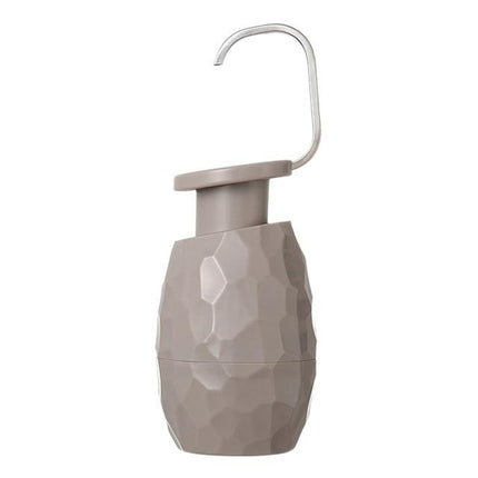 Kezaro warm gray one-handed soap dispenser with sleek design and easy pump mechanism for convenient handwashing.