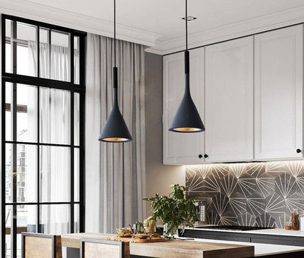 Kezaro Toulon pendant light in white with a sleek, modern design hanging from the ceiling.