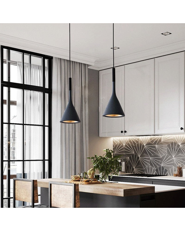 Kezaro Toulon pendant light in white with a sleek, modern design hanging from the ceiling.