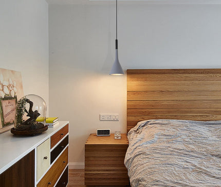 White Toulon pendant light by Kezaro with a sleek modern design, hanging fixture with a smooth, minimalist appearance.