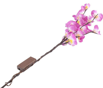 White orchid branch light by Kezaro, showcasing delicate illuminated artificial orchid flowers on a natural-looking branch.