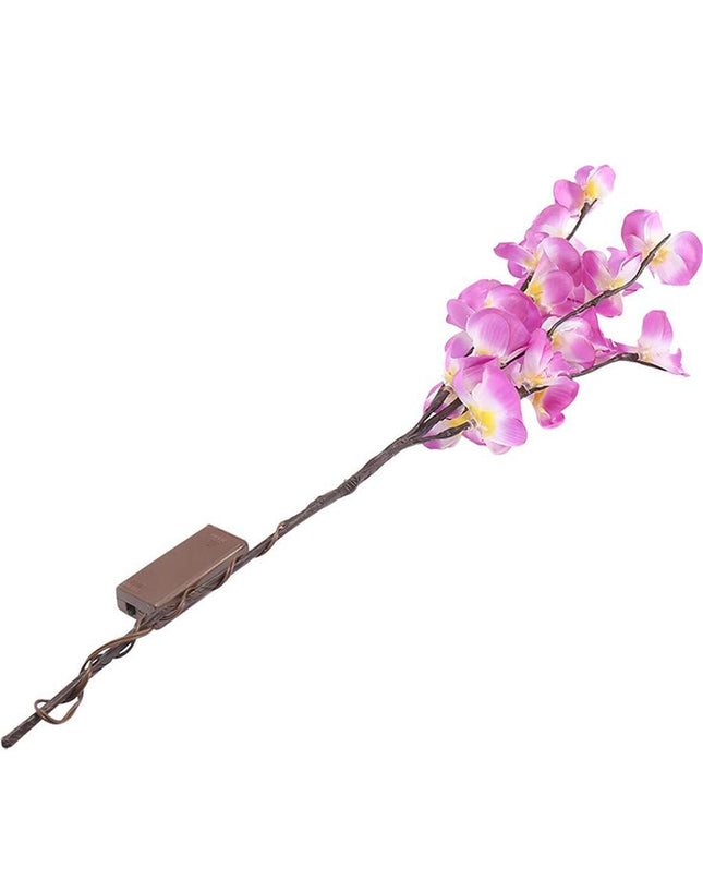 White orchid branch light by Kezaro, showcasing delicate illuminated artificial orchid flowers on a natural-looking branch.