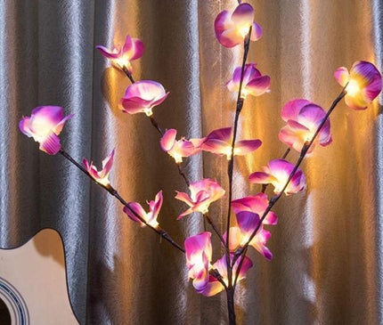 Kezaro white orchid branch with LED lights, decorative artificial orchid stem for home decor and floral arrangements.